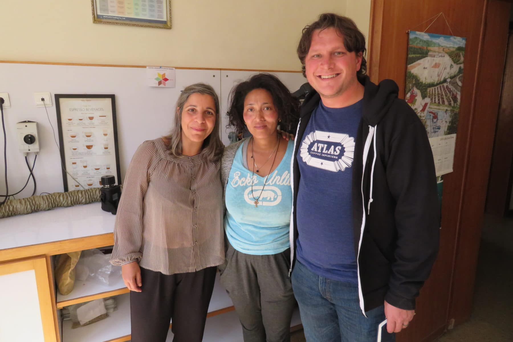 Blueprint member Mike Marquard poses with Heleanna Georgalis and Hana Kassahun Biligin of Moplaco, one of Blueprint's coffee sourcing partners in Ethiopia.