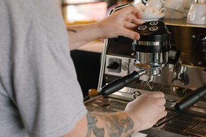 Barista making an espresso.