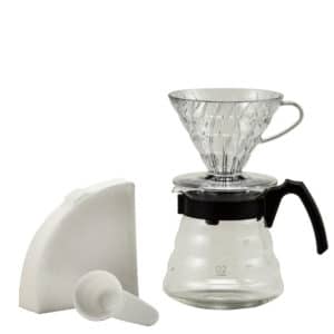 The v60 brewing set includes a dripper, decanter, starter pack of filters, and a plastic scoop.