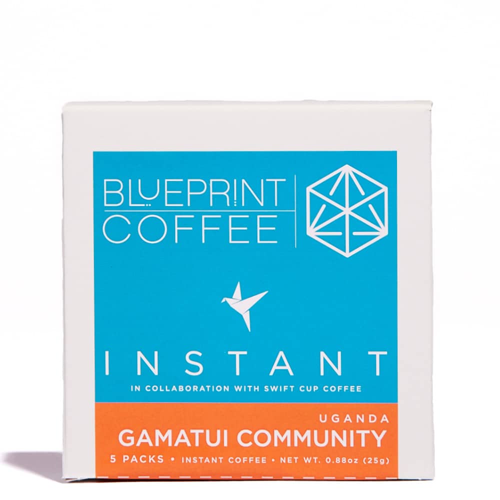 A 5-pack box of Gamatui Community Instant Coffee roasted by Blueprint Coffee. It has a blue top with the Blueprint Coffee logo and the name of the coffee blazed in orange.