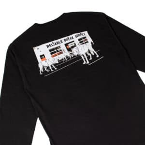 A black long sleeved t-shirt with a drawing of wolves in front of their Watson Road coffee shop.