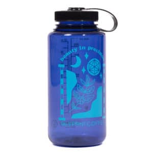 A 32-fluid-ounce Nalgene bottle featuring custom Blueprint Coffee Artwork. The bottle is a translucent navy blue with black cap and custom artwork printed in a lighter blue.