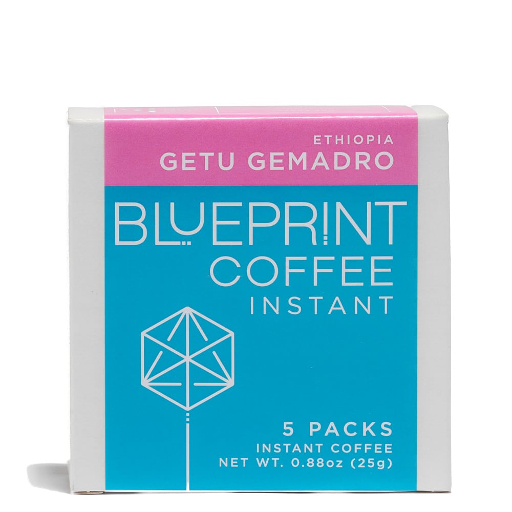 A 5-pack box of Getu Gemadro instant coffee featuring the Blueprint Coffee logo in blue and the coffee name in pink.