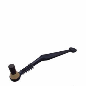 A black Pallo Gasket Brush, with scrubbing bristles on one end and a small scoop on the opposing end.