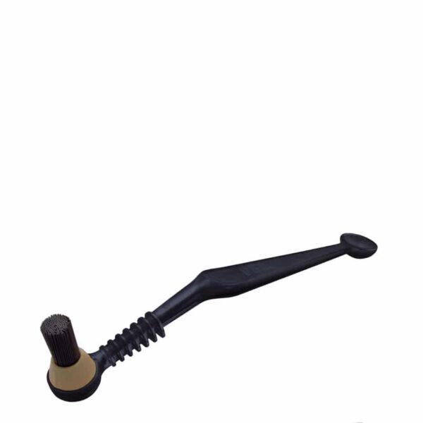 A black Pallo Gasket Brush, with scrubbing bristles on one end and a small scoop on the opposing end.