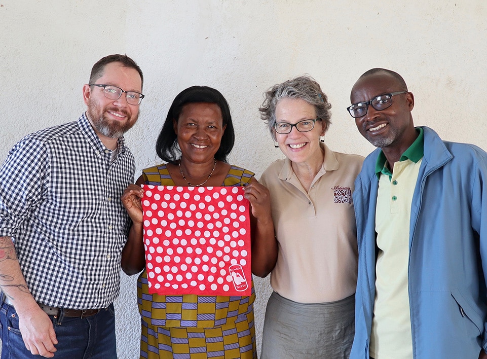 From left to right: Me, Marthe Uwiherewenimana - Ejo Heza Coop president, Ruth Ann Chruch, Gervais Karitare - Executive Director Kopakama. From left to right: Me, Marthe Uwiherewenimana Ejo Heza Coop president, Ruth Ann Chruch, Gervais Karitare, Executive Director Kopakama.