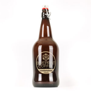 A translucent brown bottle, or growler, featuring the Blueprint Coffee logo and a swinging sealable cap.