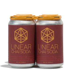 A 4-pack of maroon Chai Soda cans bearing the Linear logo in orange.