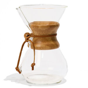 The Chemex 6-cup coffeemaker featuring a wooden handle with the classic, signature leather tie around the middle.