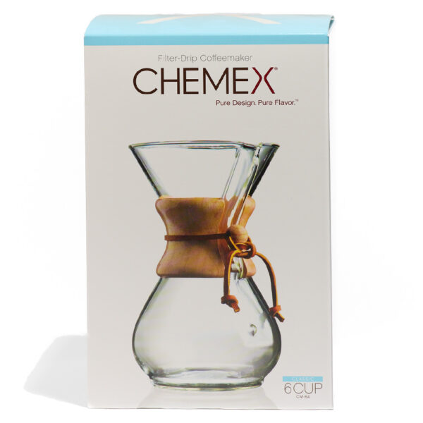 A white box containing a Chemex 6-cup coffee maker. A photo of the product is on the outside of the box with the brand name at the top.