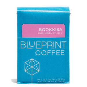 A blue 10-ounce bag of Bookkisa, Ethiopia coffee beans featuring the Blueprint Coffee Logo and a removable info card.