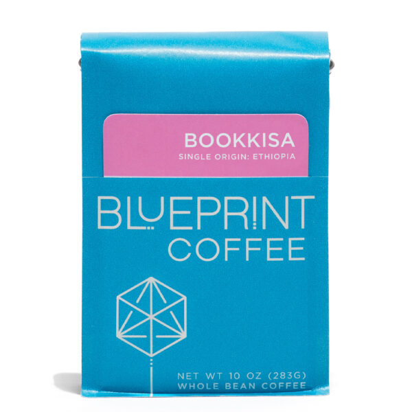 A blue 10-ounce bag of Bookkisa, Ethiopia coffee beans featuring the Blueprint Coffee Logo and a removable info card.