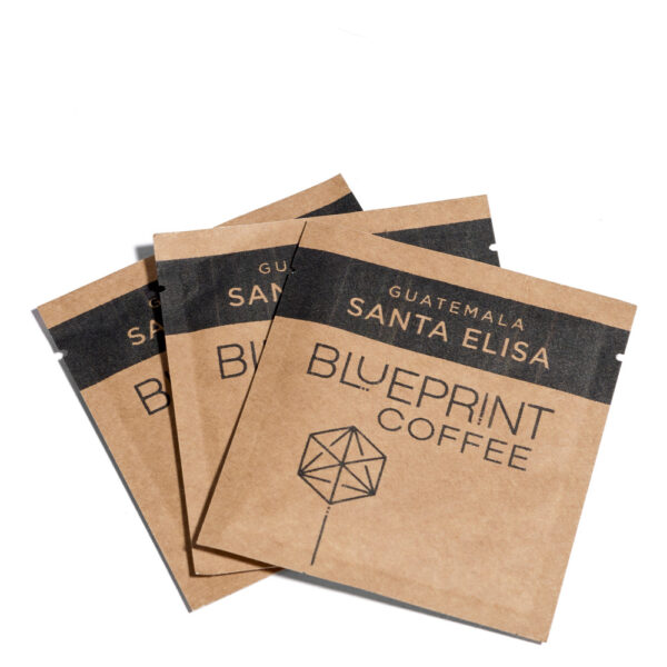 3 sachets of Santa Elisa instant coffee.