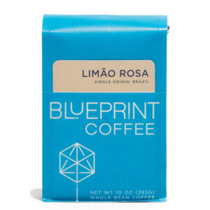 A blue 10-ounce bag of Limão Rosa coffee beans featuring the Blueprint Coffee Logo and a removable info card.