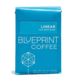 A blue 10-ounce bag of Linear Cold Brew Blend coffee beans featuring the Blueprint Coffee Logo and a removable info card.