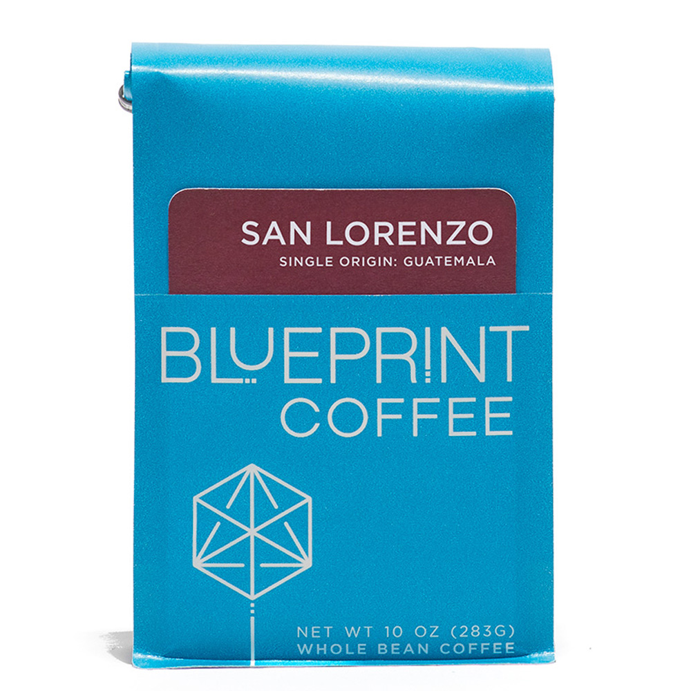 A blue 10-ounce bag of San Lorenzo, Guatemala coffee beans featuring the Blueprint Coffee Logo and a removable info card.