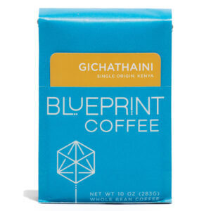 A blue 10-ounce bag of Gichathaini, Kenya coffee beans featuring the Blueprint Coffee Logo and a yellow removable info card.