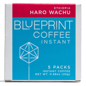 A white box containing Haro Wachu, Ethiopia instant coffee roasted by Blueprint Coffee. The box features the Blueprint Coffee logo in blue and the coffee name in red.