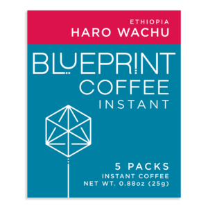 The label of a white box containing Haro Wachu, Ethiopia instant coffee roasted by Blueprint Coffee. The box features the Blueprint Coffee logo in blue and the coffee name in red.